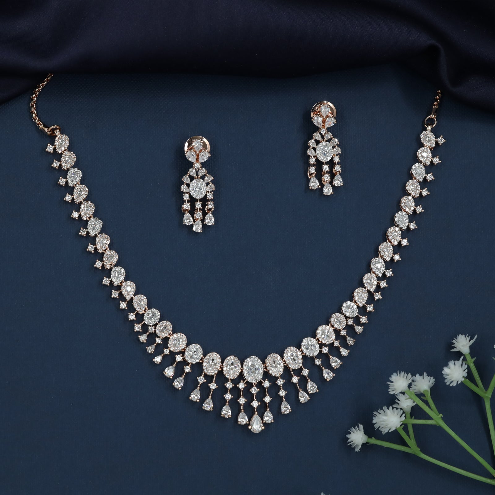 Radiating Oval Sweep Rose Gold Necklace with Hanging Tassel Detailing