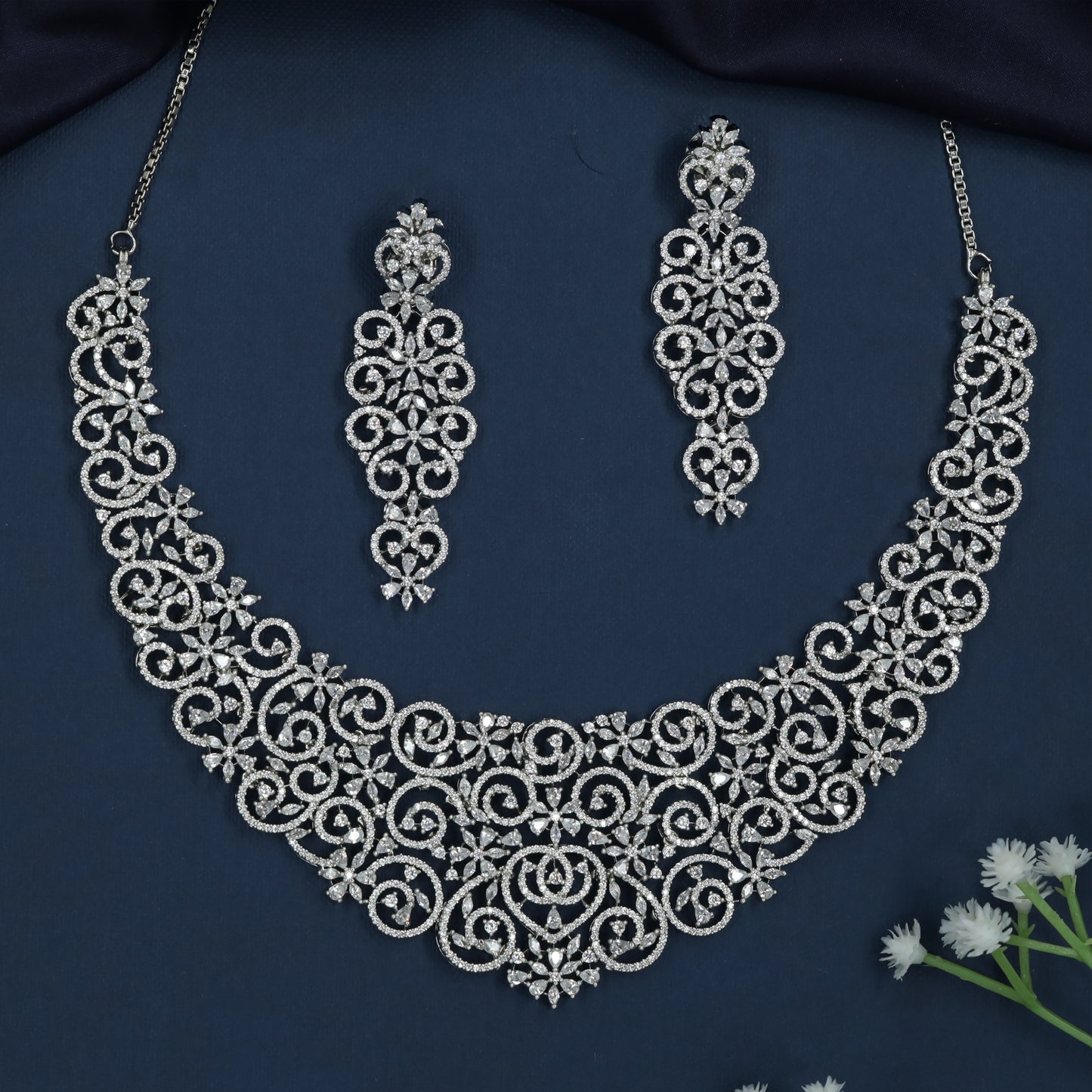 Structured Scroll Garland Rhodium Necklace with Curved Floral Spread