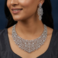 Structured Scroll Garland Rhodium Necklace with Curved Floral Spread