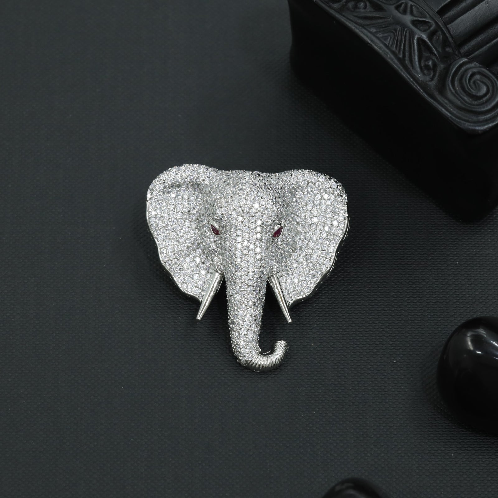 Signature Tusker Brooch with Ornamental Contour Detailing