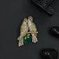 Twin Parrot Brooch with PavÃ© Feather Detailing and Branch Layout
