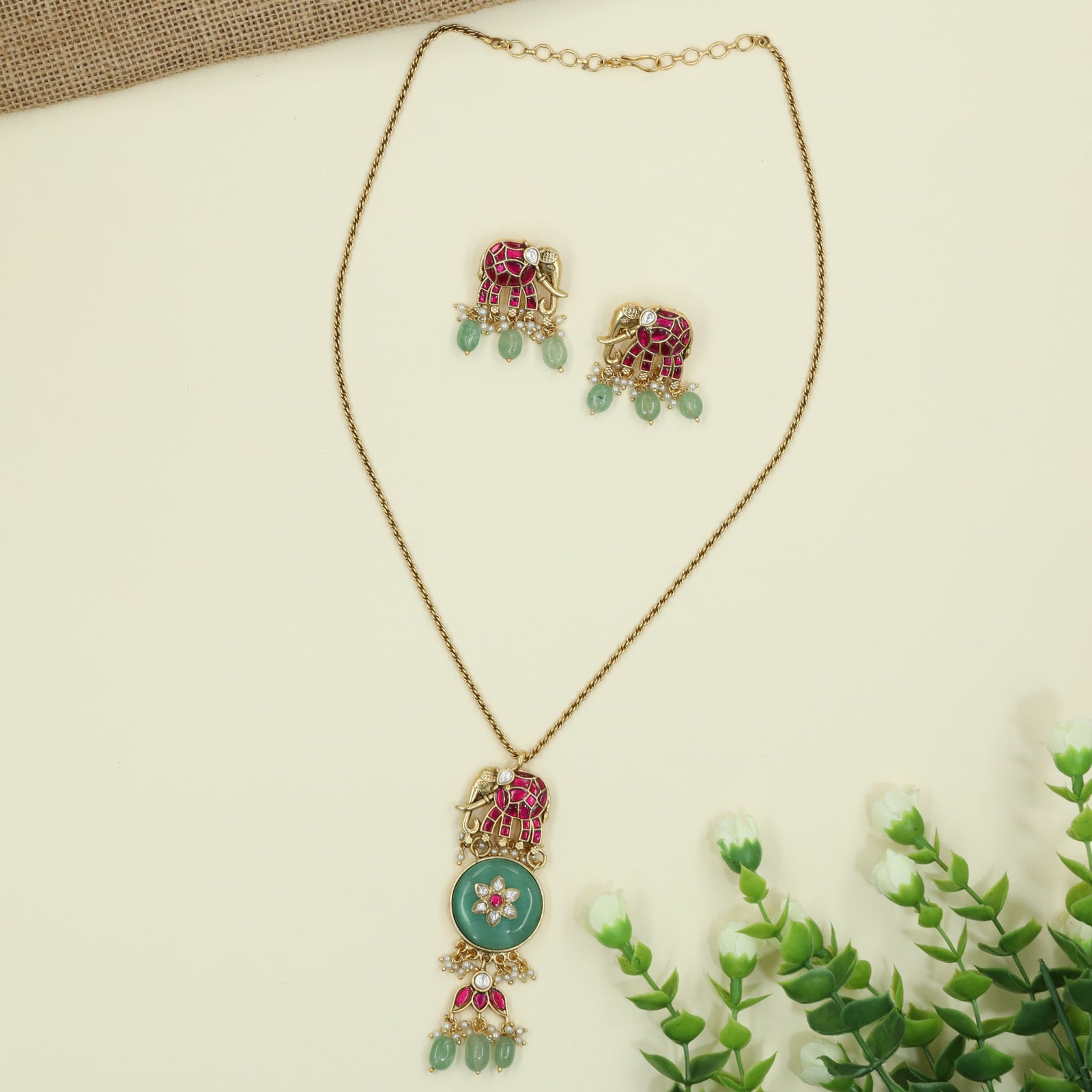 Grand Elephant Pendant Chain With Decorative Floral Accents
