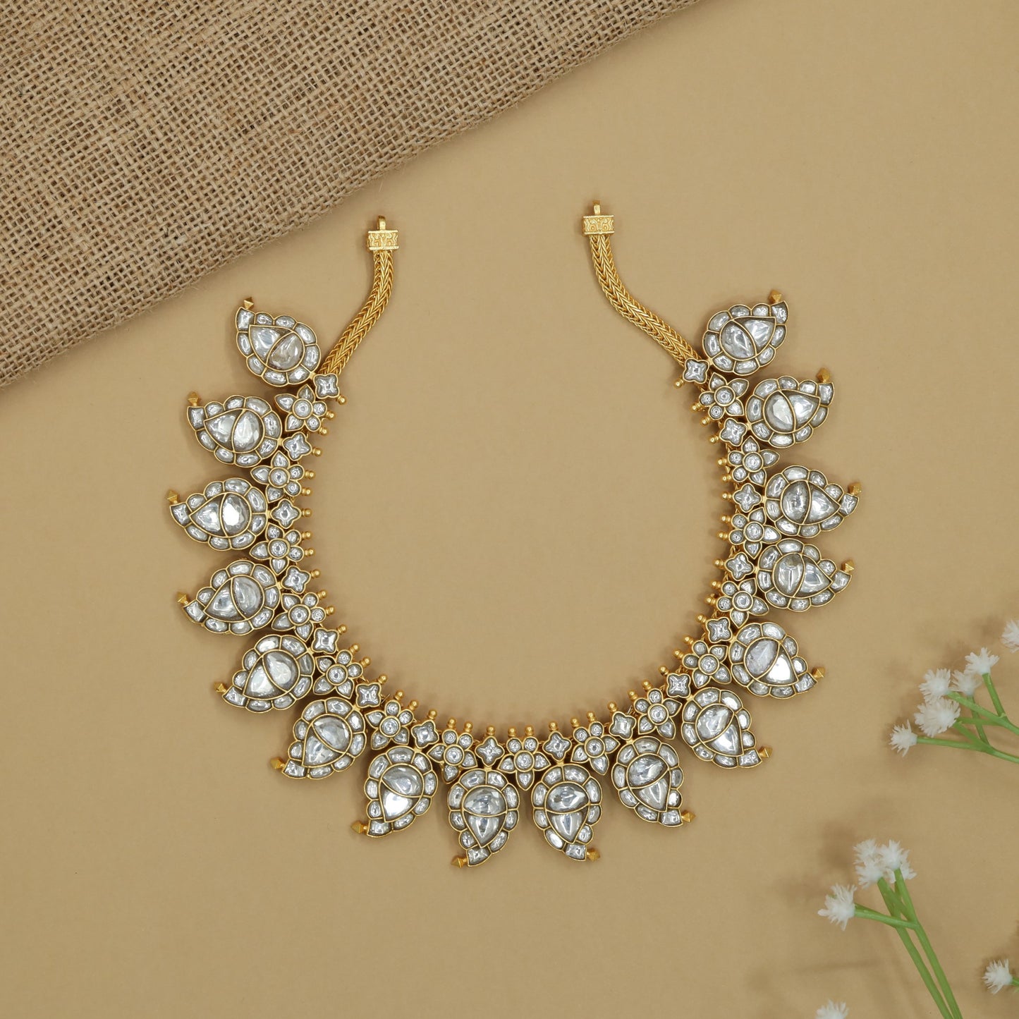 Floral Mango Kundan Necklace with Decorative Border Rows and Curves