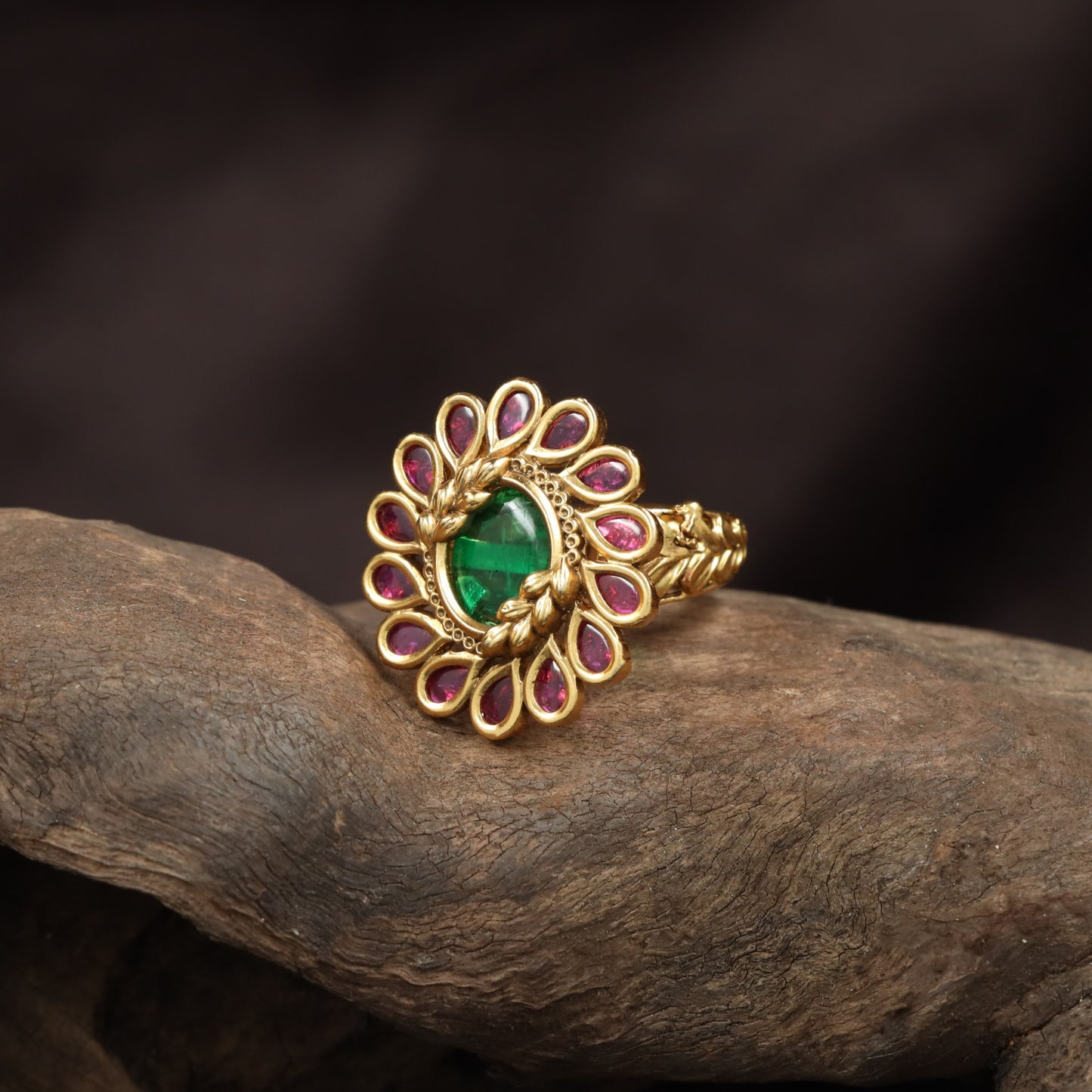 Grand Antique Finger Ring framed by Floral Panel Borders
