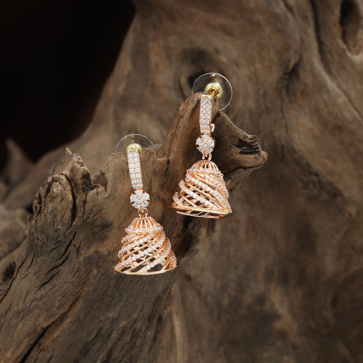 Jewel weave Rose gold jumka with rounded strip arrangement