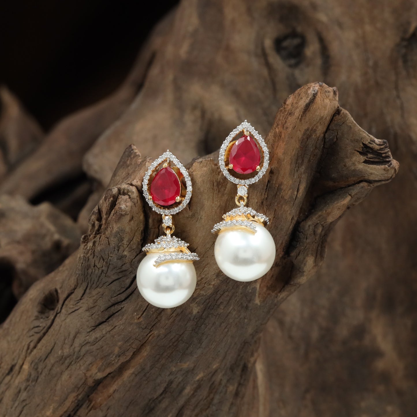 Flared stud hanging with rounded pearl detailing