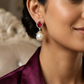 Flared stud hanging with rounded pearl detailing