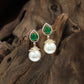 Flared stud hanging with rounded pearl detailing