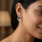 Jeweled round Stud with open floral arrangement