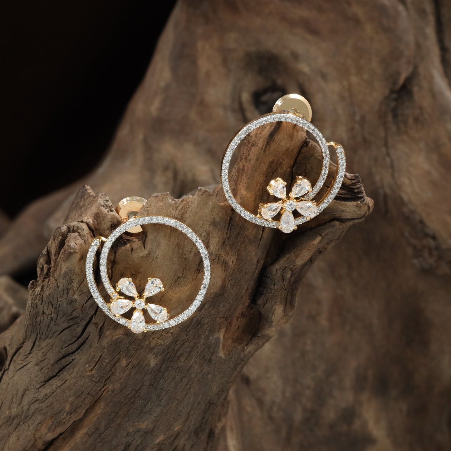 Jeweled round Stud with open floral arrangement