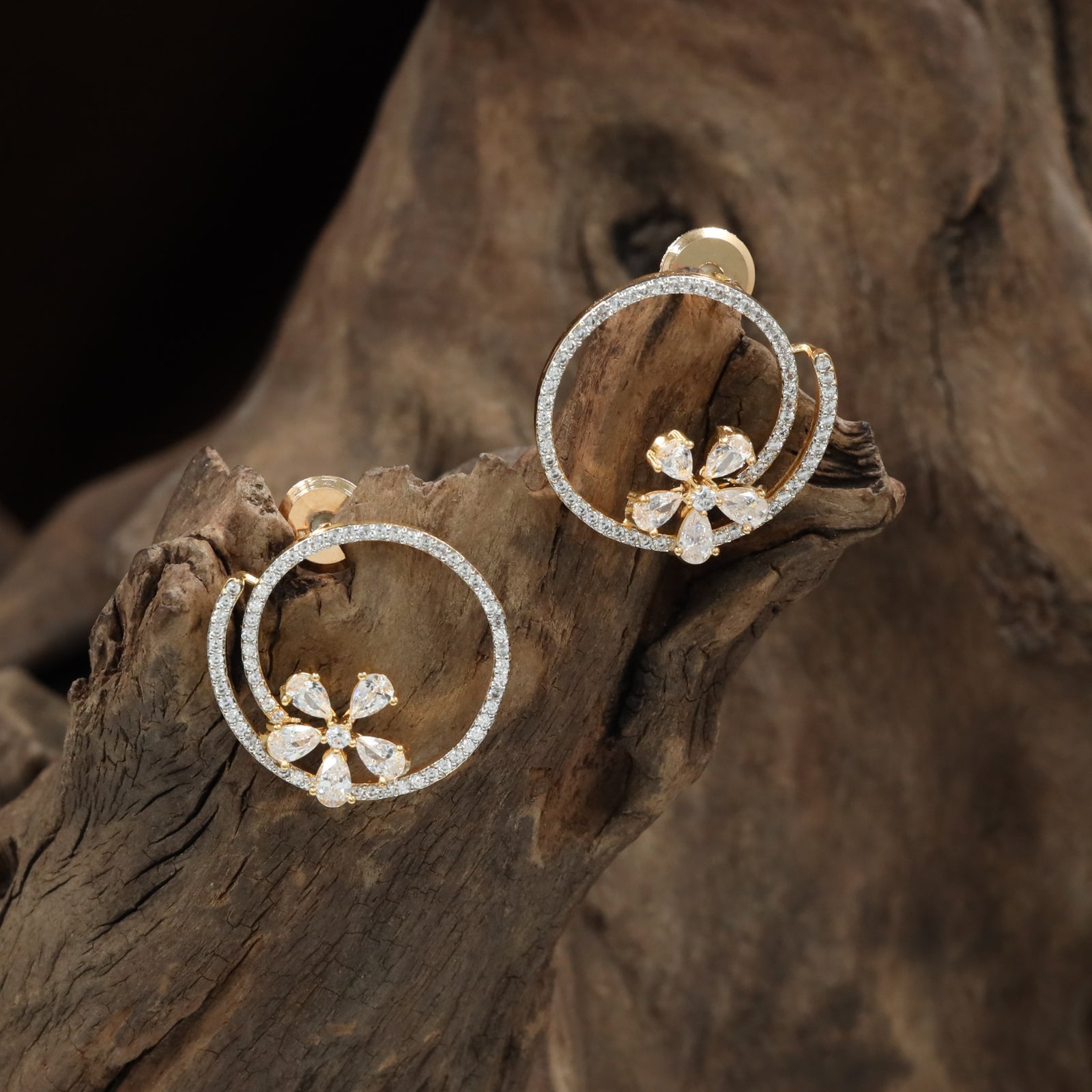 Jeweled round Stud with open floral arrangement
