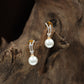 Glittering pearl Stud with bordered hook arrangement