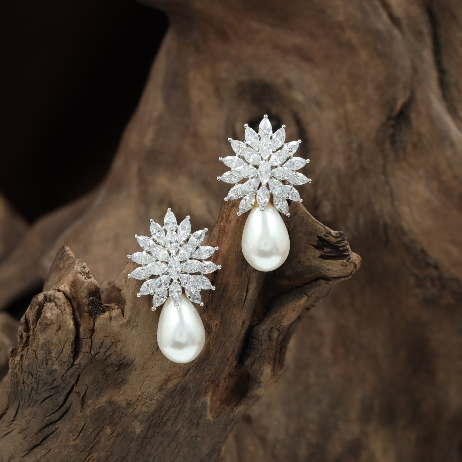 Glittering floral Stud with hanging pearl arrangement