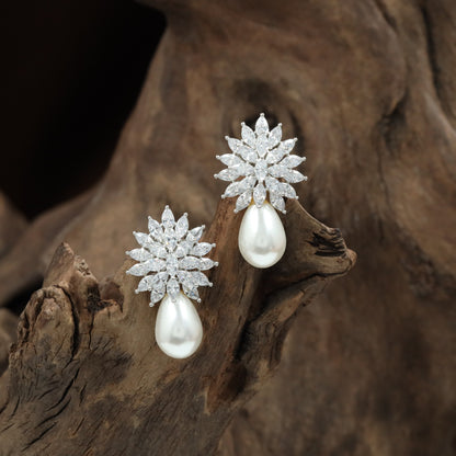 Glittering floral Stud with hanging pearl arrangement