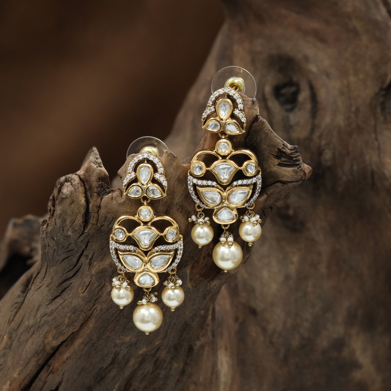 Silken Outline Kundan Hanging with Curved Frame Sections and Drop Tassels