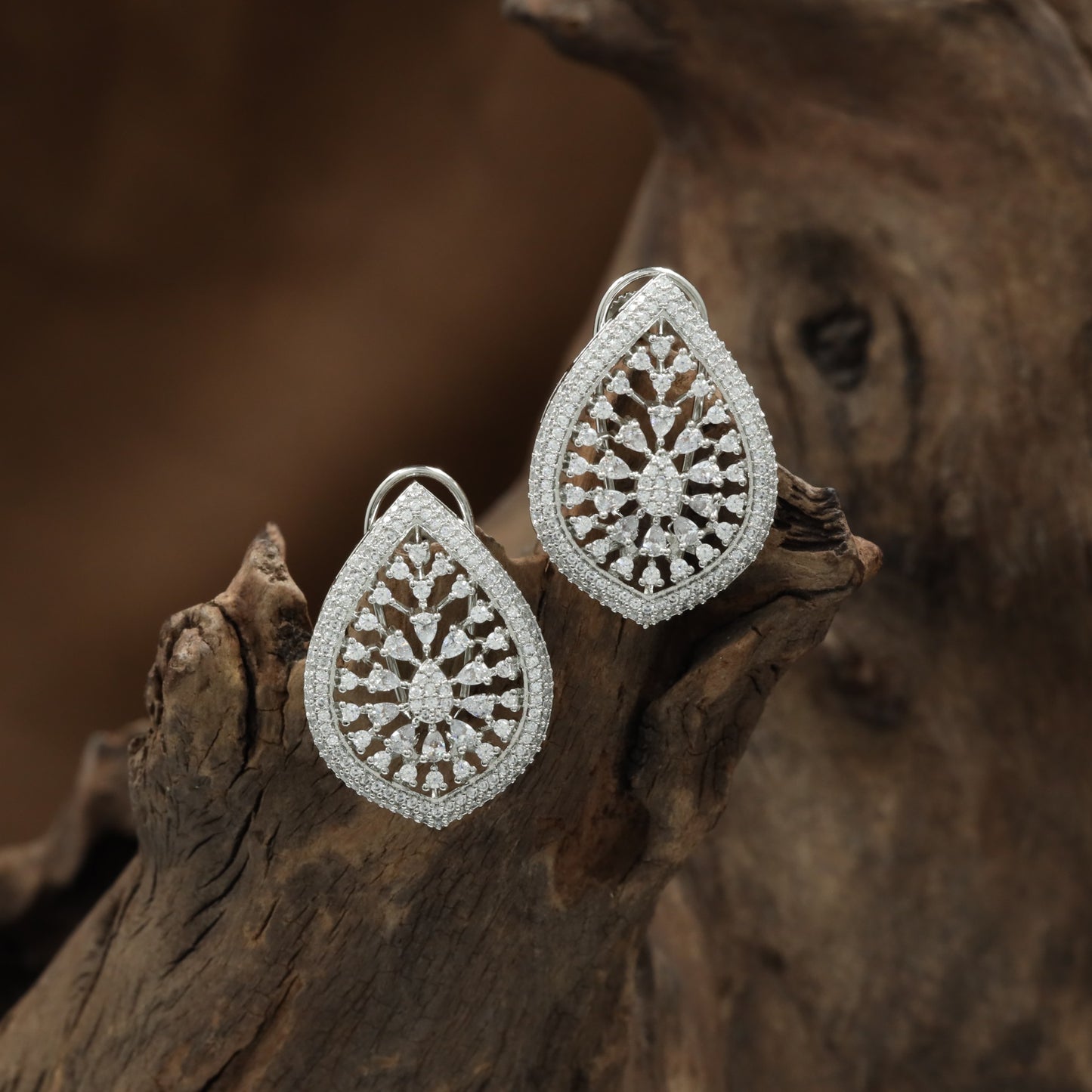 Border Teardrop Rhodium Stud with Layered Floral Layout and Raised Detailing