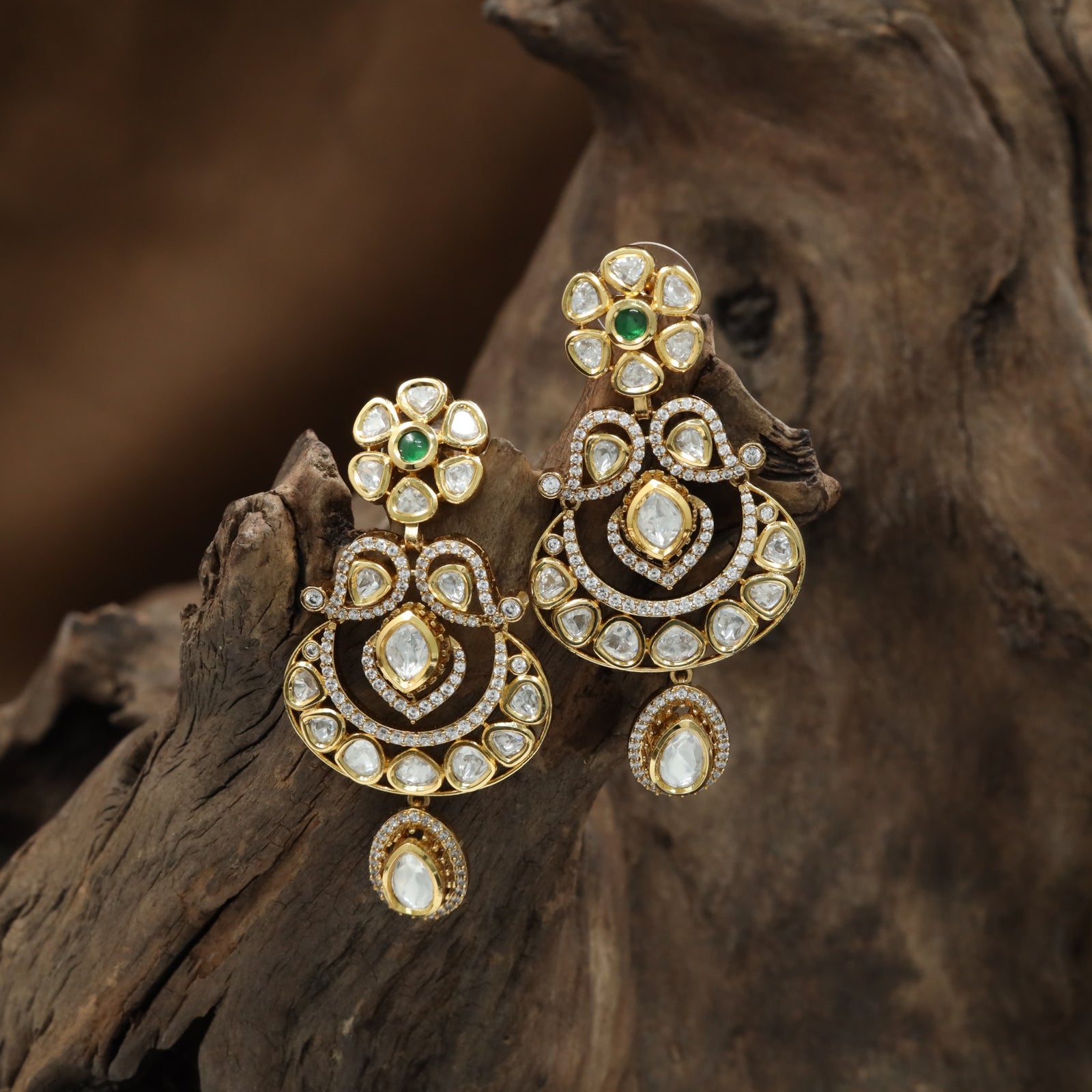 Curved Arch Kundan Hanging with Oval Center Styling and Tassel Drop Finish