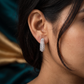 Parallel Line Rhodium Stud with Layered Strip Layout and Open Curve Styling