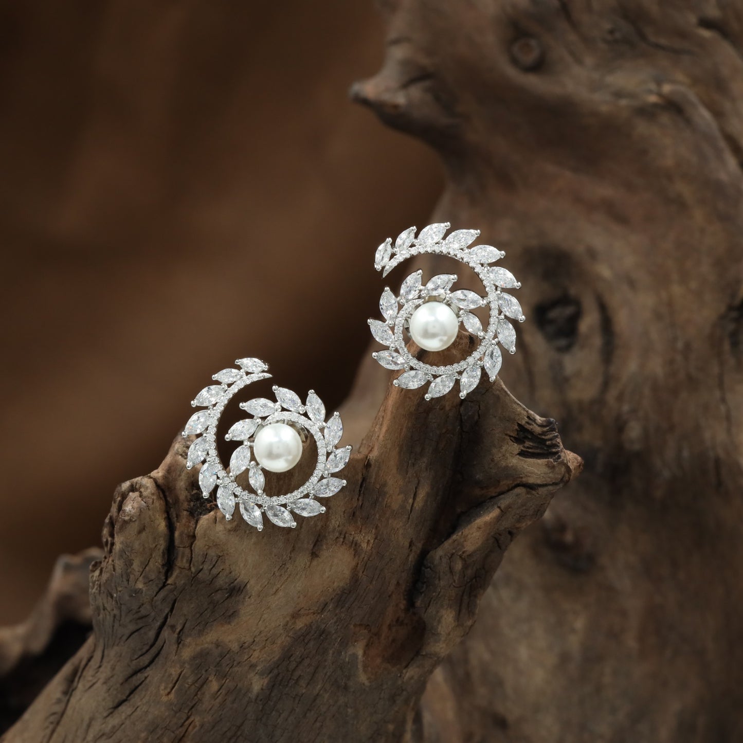 Spiral Frame Rhodium Stud with Circular Pearl Center and Leaf Detailing