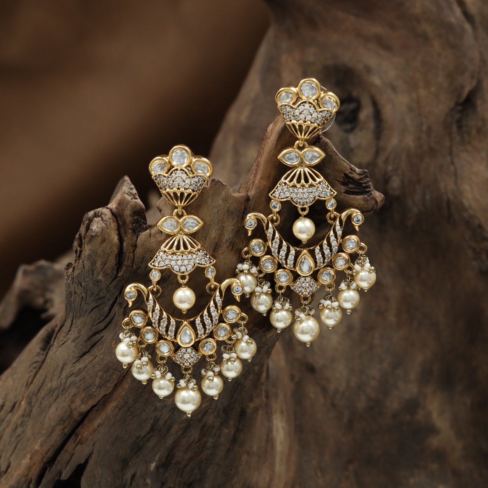 Floral Pearl Kundan Hanging with Open Oval Layout and Tassel Cluster Detailing