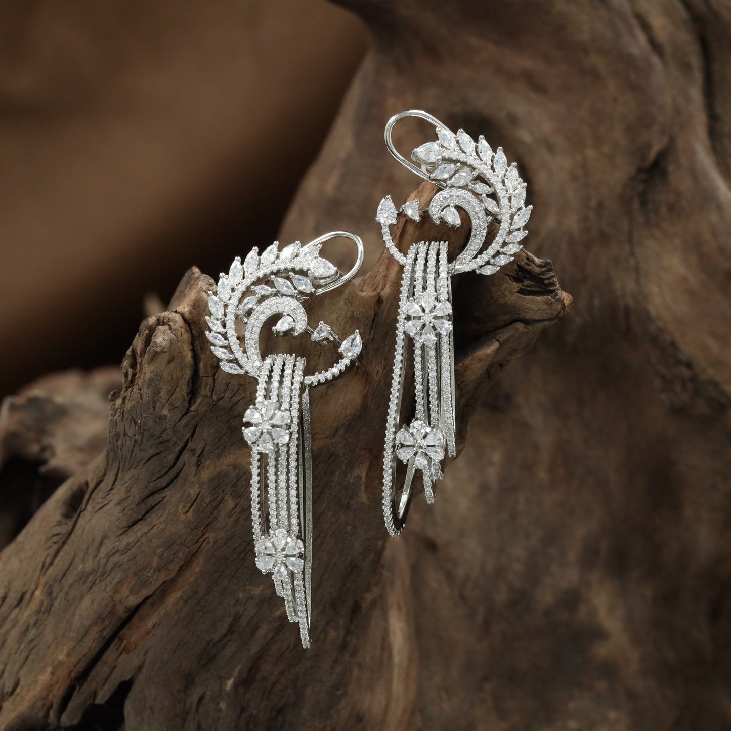 Feather Arc Rhodium Hanging with Layered Border Styling and Fringe Chains
