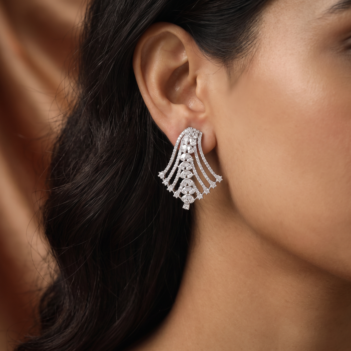 Wave Fringe Rhodium Stud with Layered Fan Styling and Hanging Pear Drops