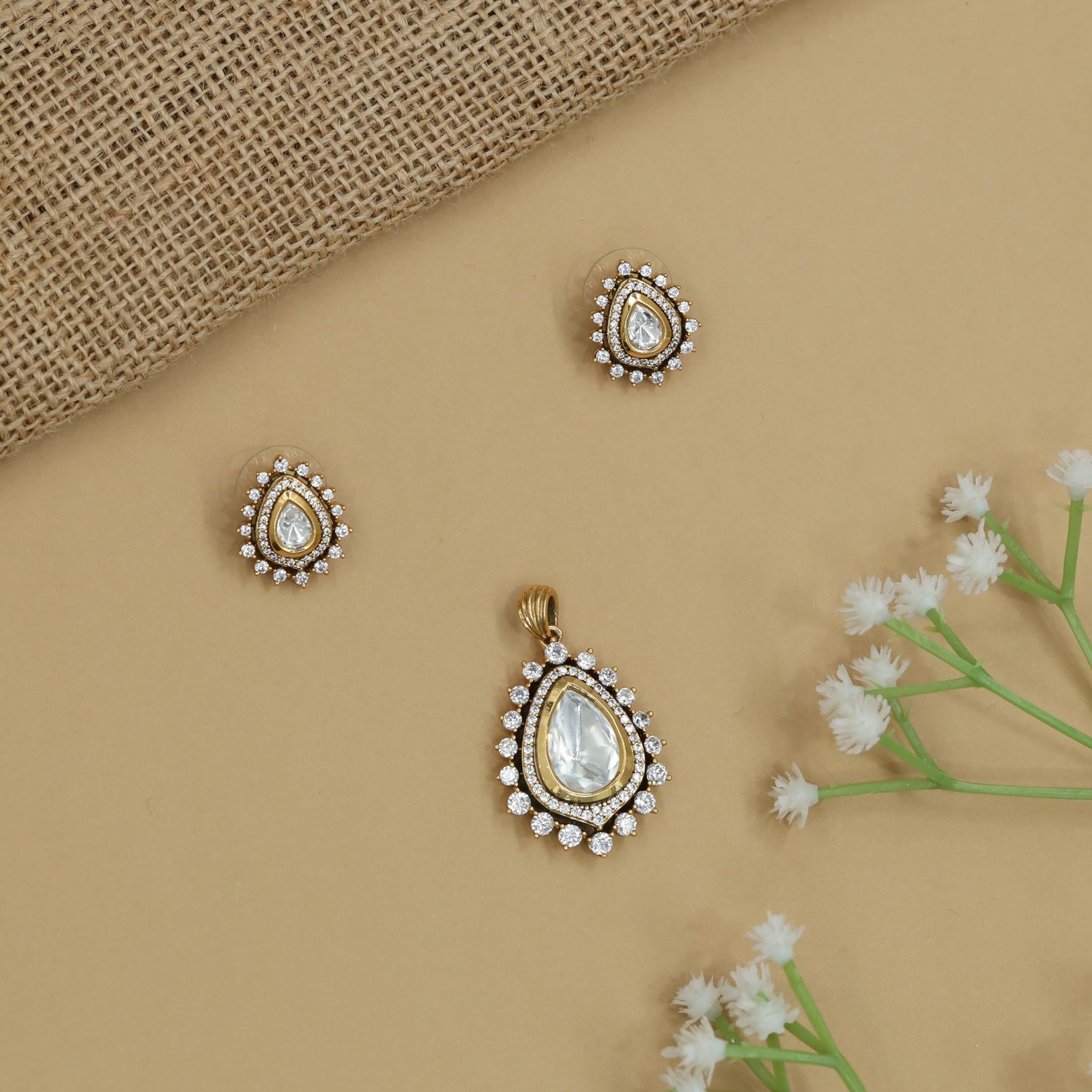 Grand Teardrop Pendant Set with Circular Edge Arrangement and Matching Studs