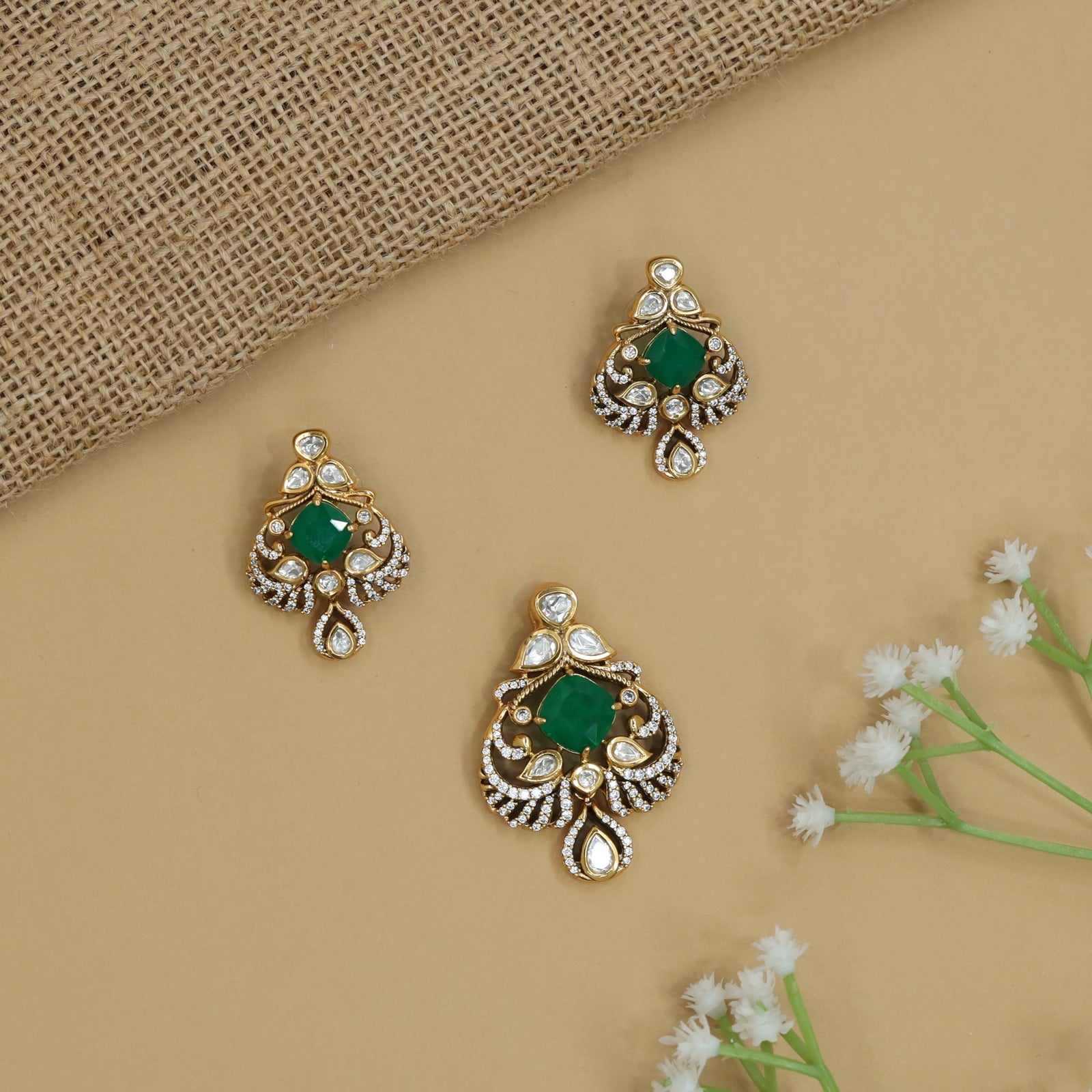 Ornate Floral Pendant Set with Curved Border Arrangement and Matching Earrings