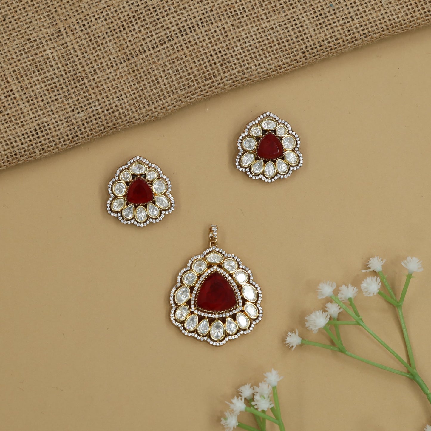 Signature Pear Kundan Pendant Set with Raised Border Placement and Coordinated Styling