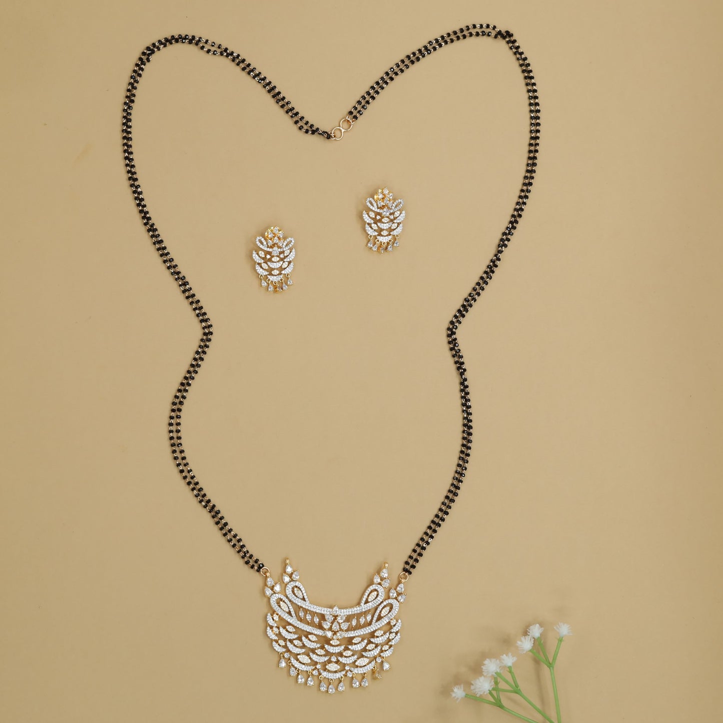 Curved Leaf Gj Mangalsutra featuring Cascading Border Layout and Drop Detailing