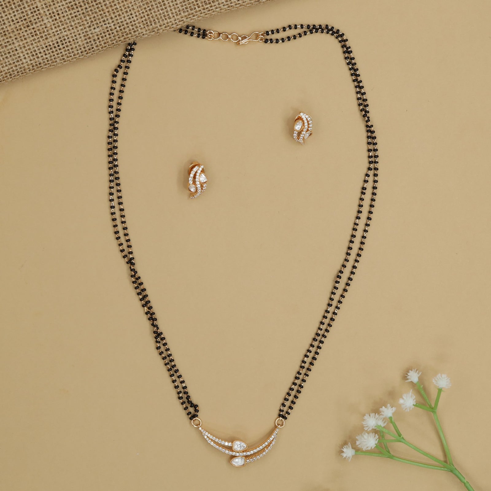 Ribbon Arc Gold Polish Mangalsutra with Hanging Oval Accent