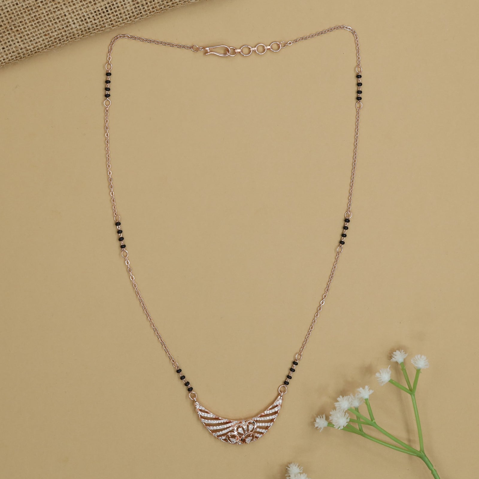 Fancy Rose Gold Mangalsutra with Curved Stripe Pattern