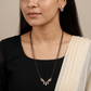 Twisted Loop Gold Polish Mangalsutra with Open Ribbon Pendant