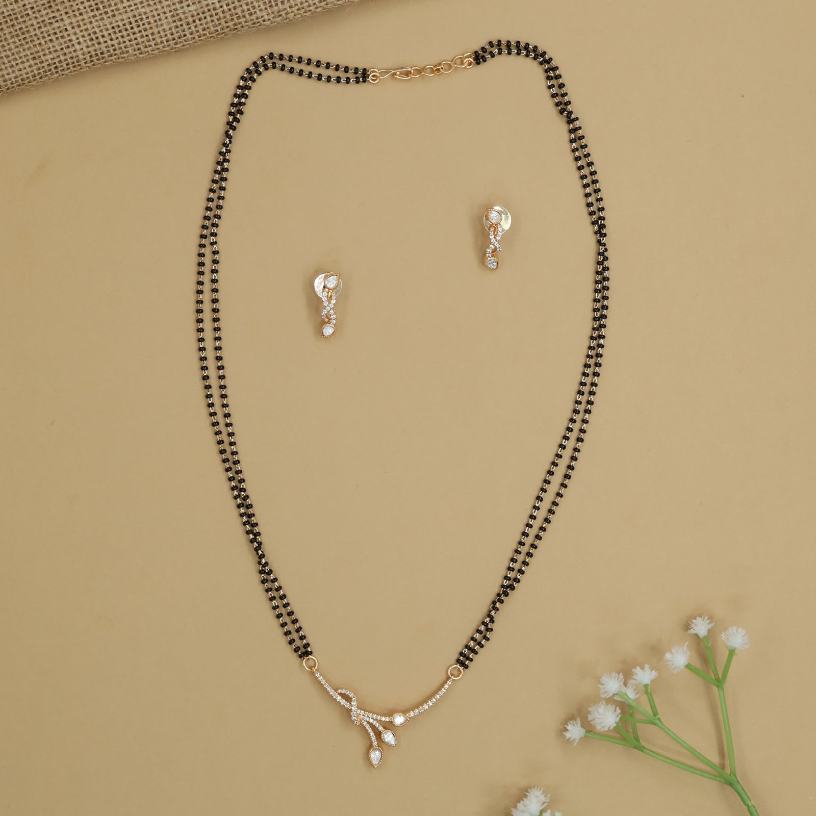Leaf Drop Gold Polish Mangalsutra with Curved Ribbon Pendant