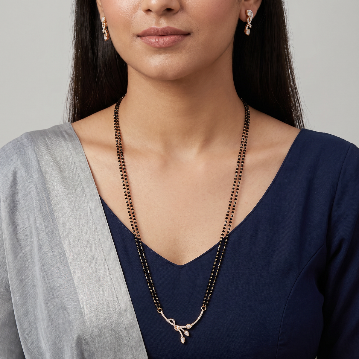 Leaf Drop Gold Polish Mangalsutra with Curved Ribbon Pendant