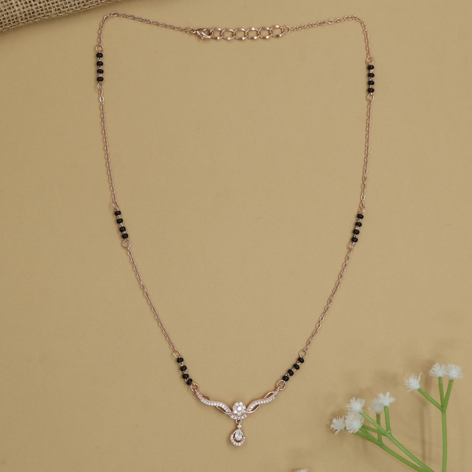 Floral Curve Gold Polish Mangalsutra with Circular Hanging Accent