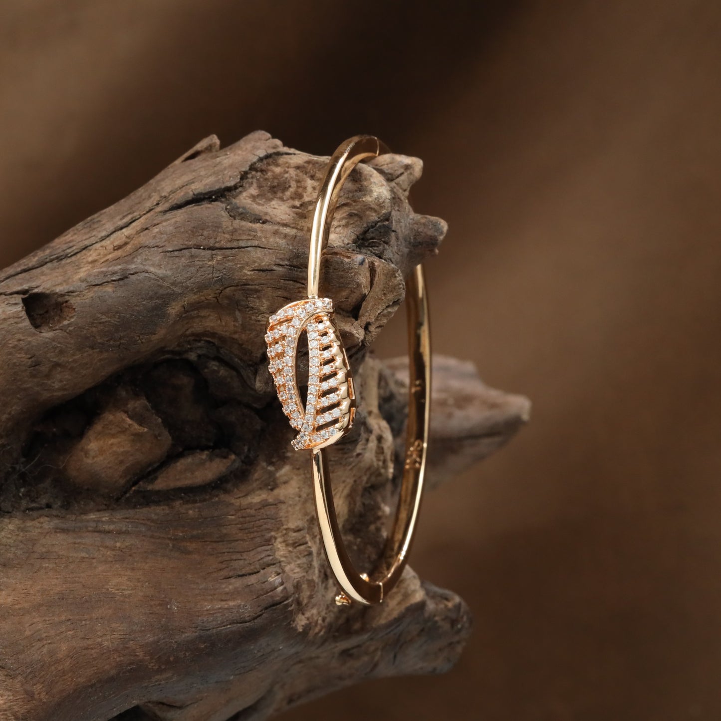 Bezel Feather Kada with Structured Leaf Placement and Curved Styling