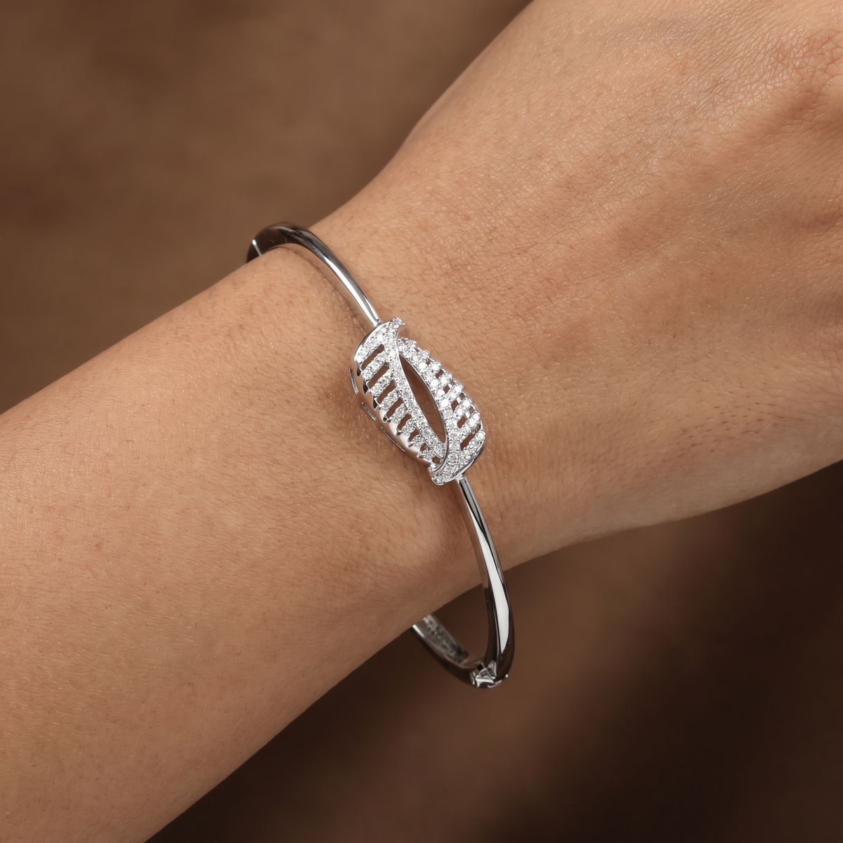 Bezel Feather Kada with Structured Leaf Placement and Curved Styling