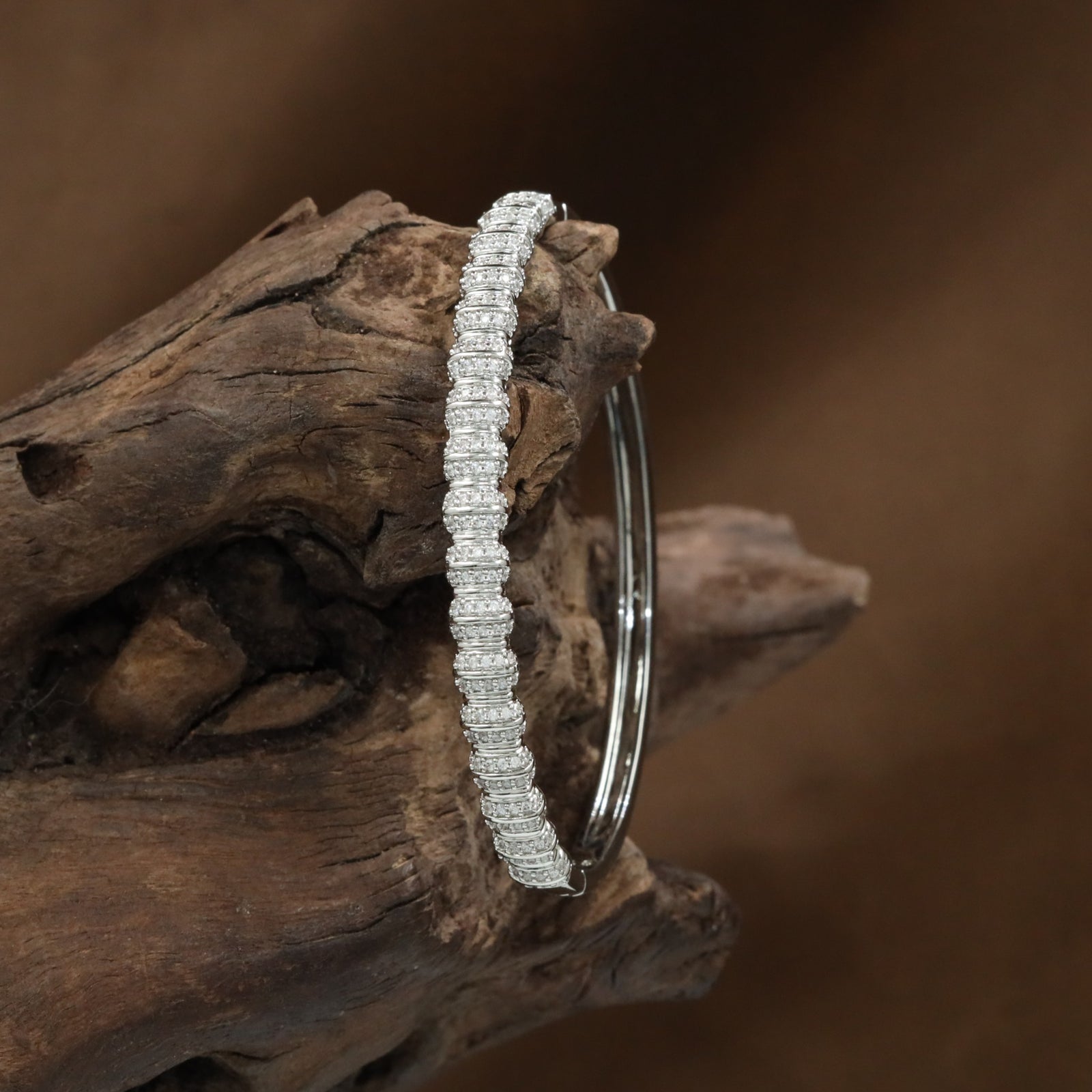 Bezel Band Kada with Continuous Frame Placement and Raised Styling