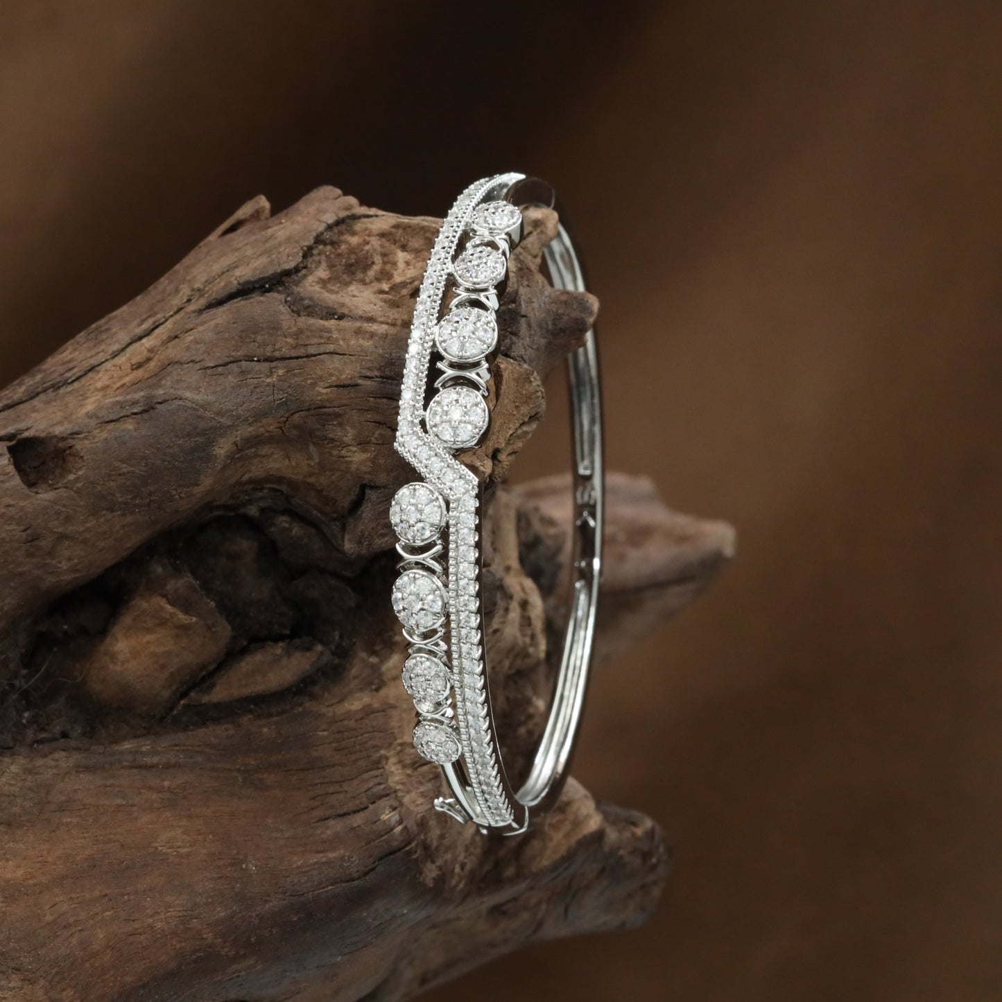 Bloom Disc Kada with Repeating Floral Arrangement and Border Detailing