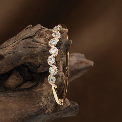 Bezel Frame Kada with Repeating Disc Arrangement and Border Styling