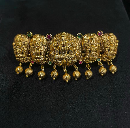 Lakshmi Hair Clip with sculpted deity panels and ornamental hanging drops