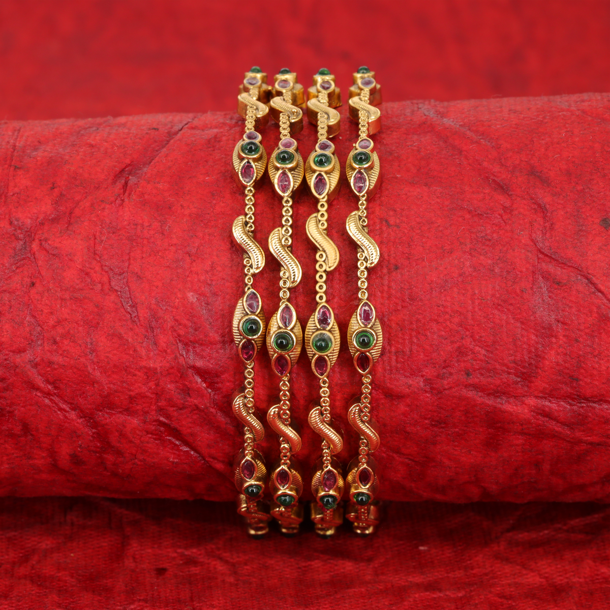 Manidvipa Serpentine Link Bangles with Marquise Gem Settings