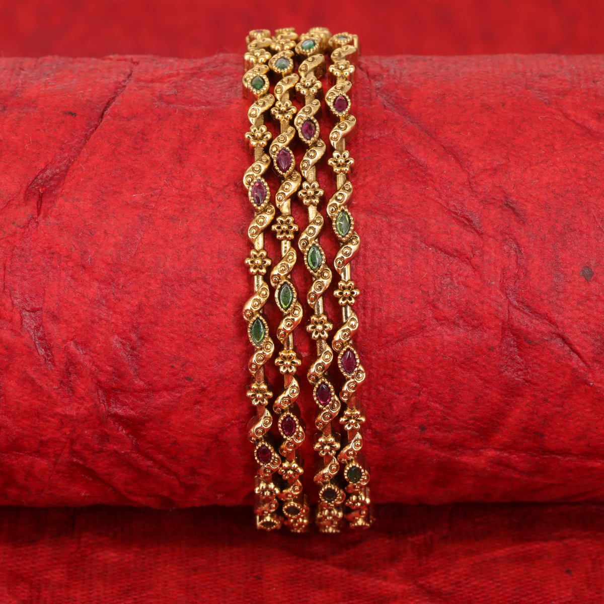 Ratnarekha Twisting Vine Bangles with Marquise Gem Highlights