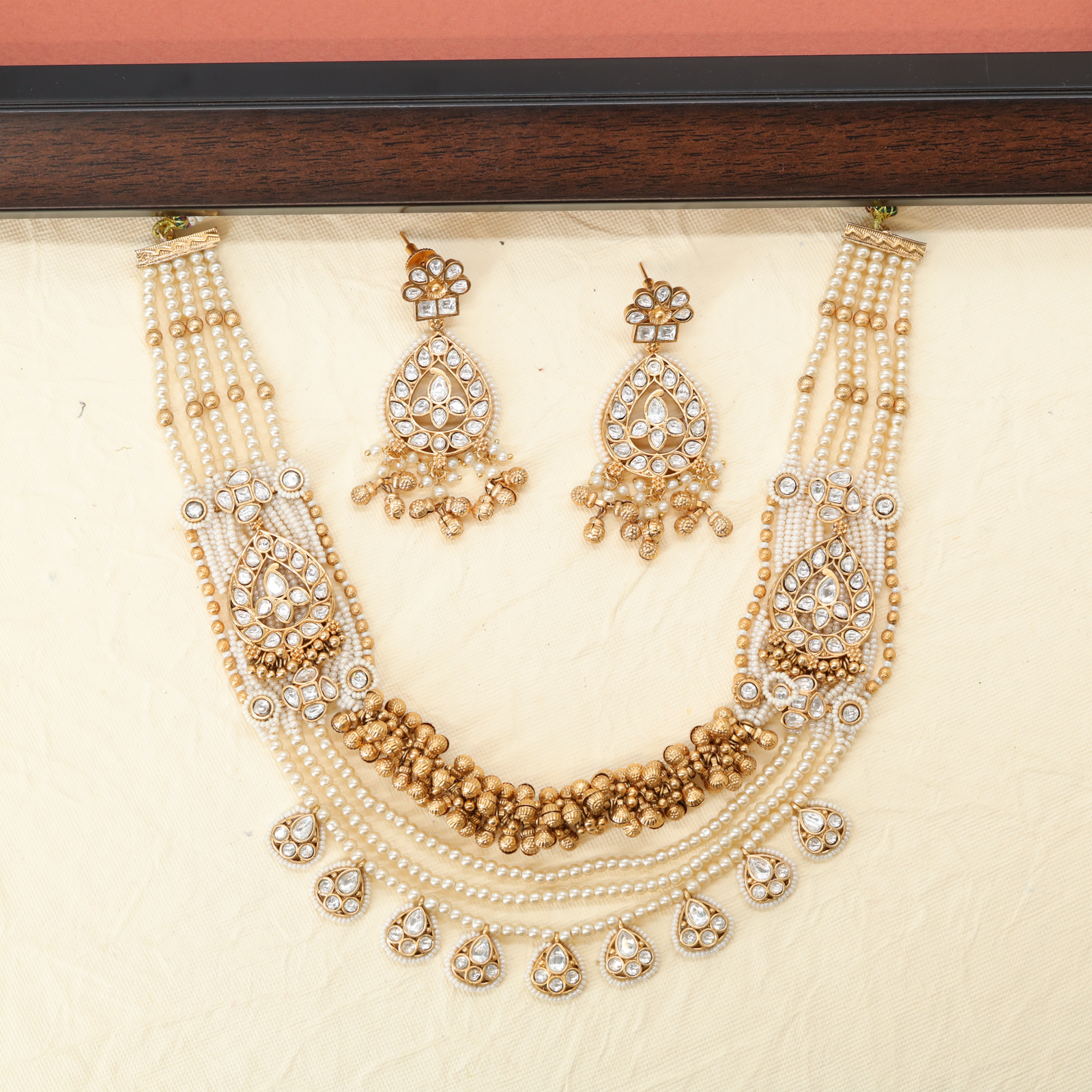 Multi Strand Pearl Necklace with Center Cluster Design