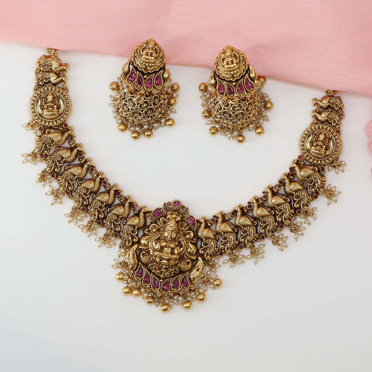 Majestic Lakshmi Idol Necklace with Sculpted Peacock Panel Links