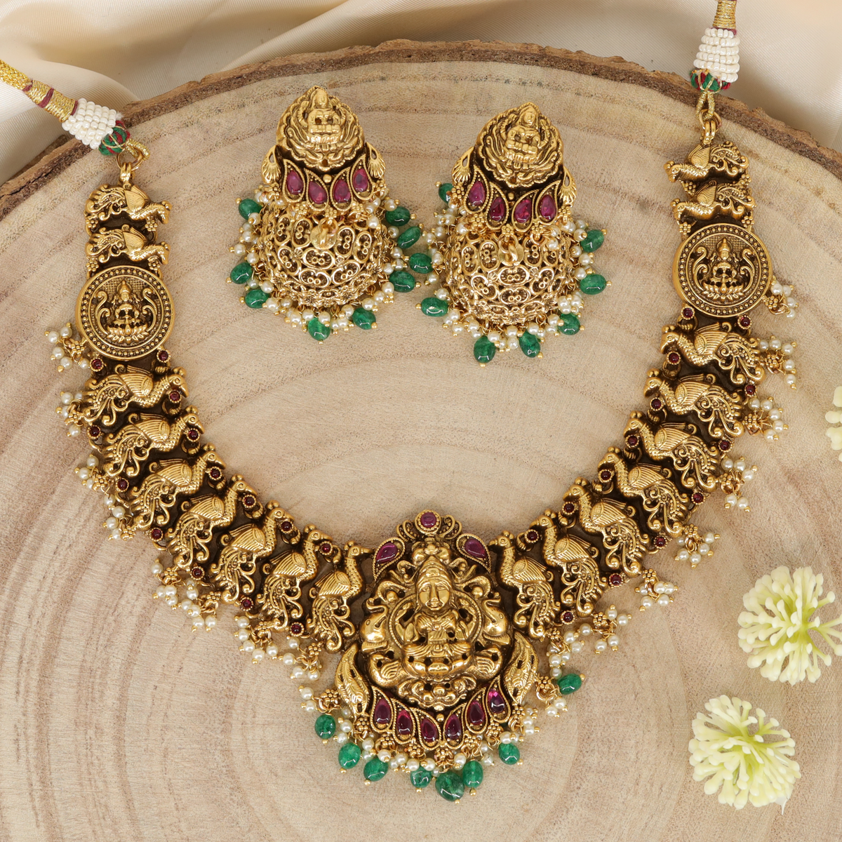 Majestic Lakshmi Idol Necklace with Sculpted Peacock Panel Links