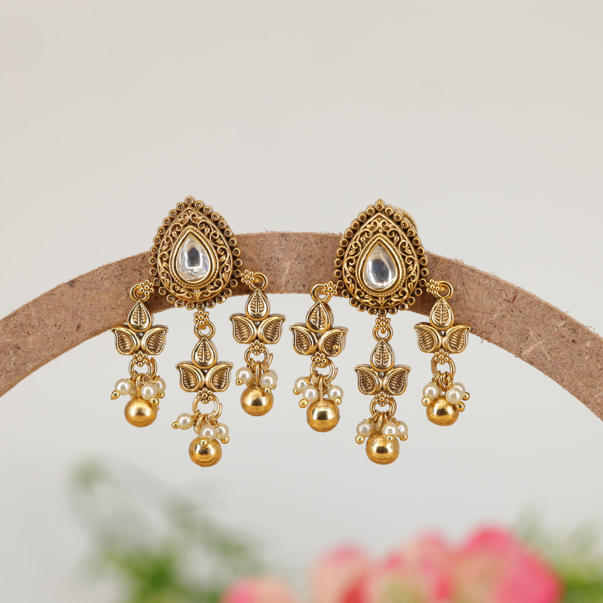 Shringara Ratna Crest Stud Earrings with Decorative Leaf Cluster Drops