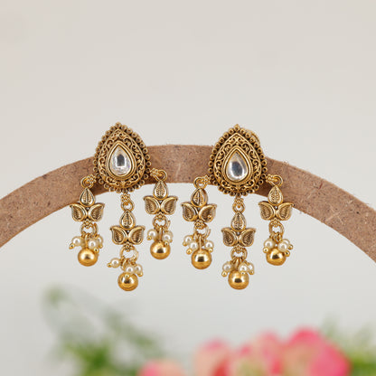 Shringara Ratna Crest Stud Earrings with Decorative Leaf Cluster Drops