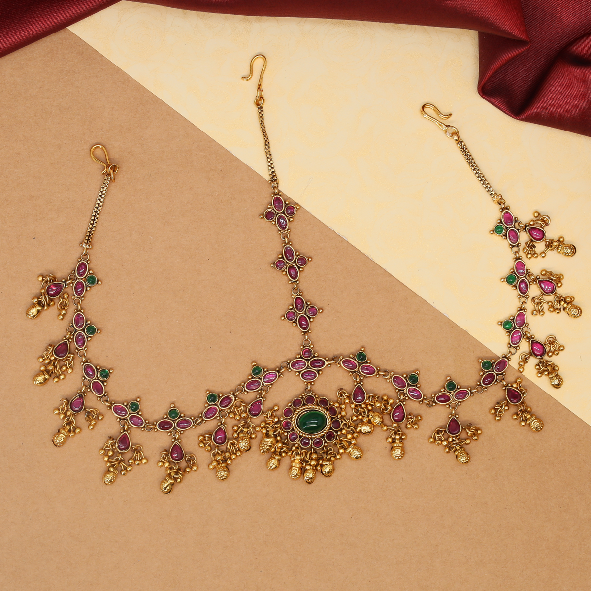 Ornamental Forehead Headset with Central Medallion and Dangling Temple Charms